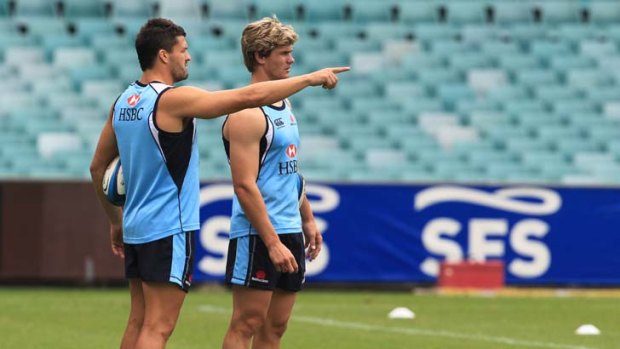 Pointing in the right direction ... two of the Waratahs' Wallabies representatives, Adam Ashley-Cooper and Berrick Barnes, prepare for the season-opening clash with the Reds.
