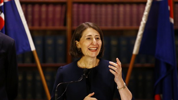 Gladys Berejiklian smiles at a press conference on Monday. 