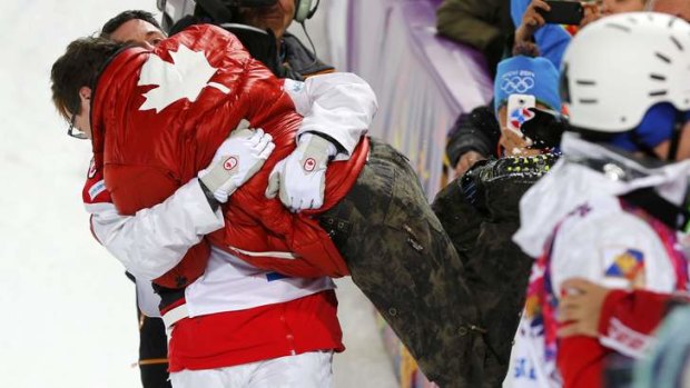 Along for the ride: Alex Bilodeau and brother Frederic Bilodeau.