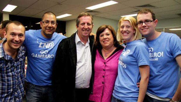 LNP candidate for Brisbane Teresa Gambaro with her husband Robert and campaign supporters at her office in Windsor on election night.