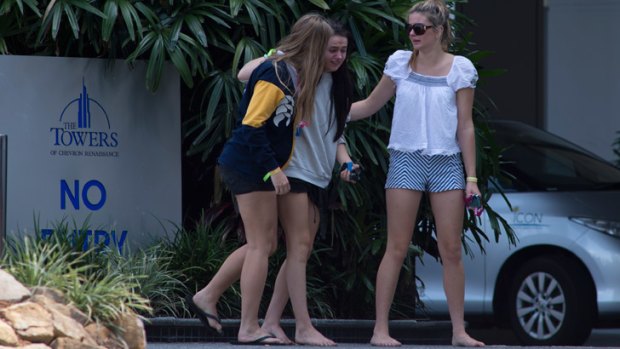 Schoolies console each other outside the Chevron Renaissance.