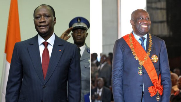 Laurent Gbabgo (right) and Alassane Ouattara have both been sworn in.