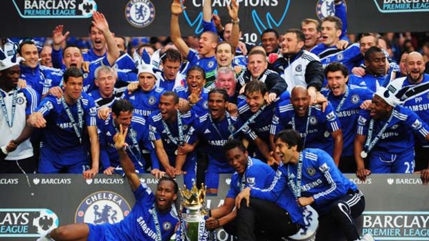 Champions ... Chelsea players and staff celebrate.