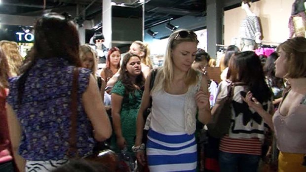 Shoppers cram into the store in Chapel Street after opening.