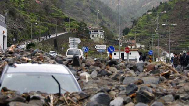 A destroyed car near Ribeira Brava, Madeira Island, after the violent rainstorms that left at least 40 people dead.