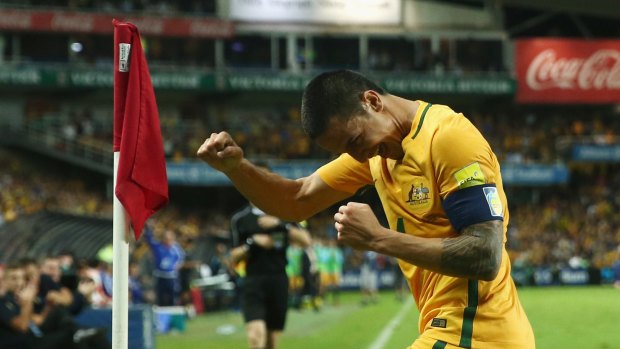 Invaluable in the early stages: Tim Cahill celebrates scoring against Jordan in the first round of world cup qualifying.