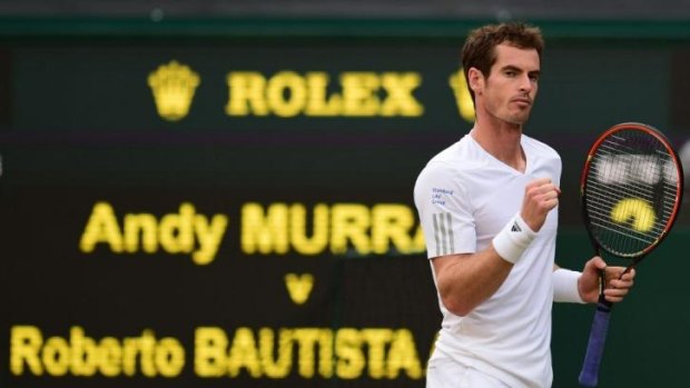 Andy Murray urges himself on after winning a point against Spain's Roberto Bautista.
