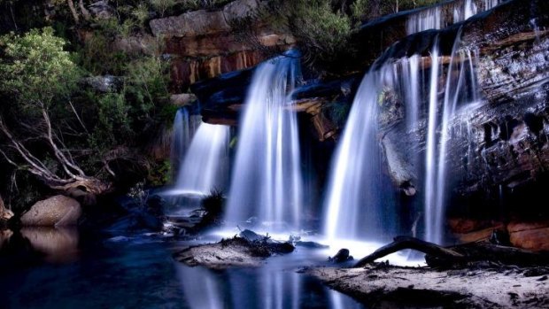 Winifred Falls after rain, Royal National Park. Light painting taken at night using a torch to illuminate the scene.