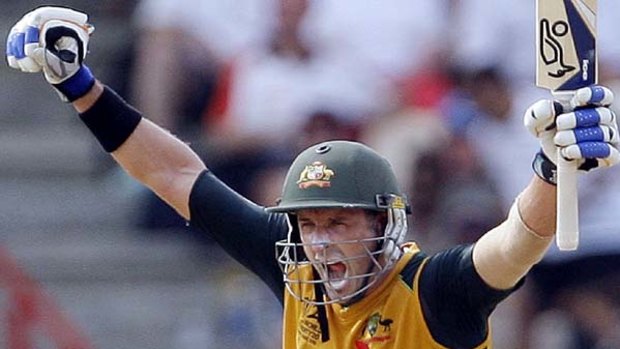 Australia's Michael Hussey celebrates after hitting the winning shot in the Twenty20 Cricket World Cup semi-final .