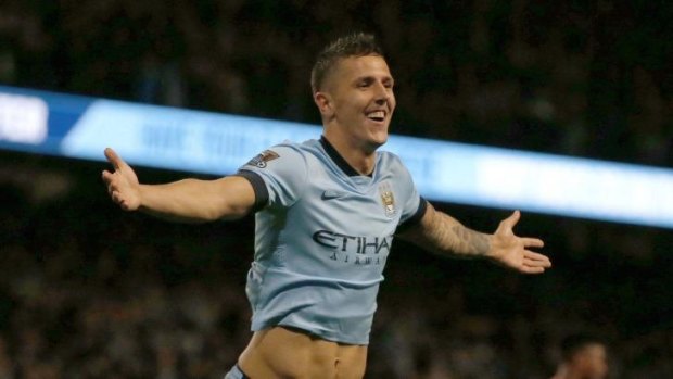 Manchester City's Stevan Jovetic celebrates after scoring a second goal against Liverpool.