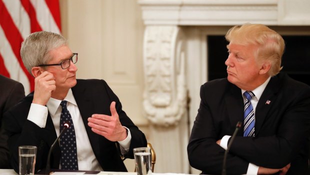 Tim Cook with US president Donald Trump in June. The Apple boss is increasingly taking a stance on social and political issues. 