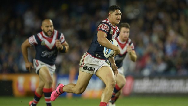 And he sprints away: Roger Tuivasa-Sheck makes a break to score.