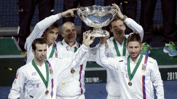 Czech Republic's team members (left to right) Radek Stepanek, Lukas Rosol, captain Vladimir Safarik, Tomas Berdych and Jan Hajek pose with the Davis Cup trophy.