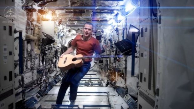 Canadian astronaut Chris Hadfield performs his zero-gravity version of David Bowie's hit, <i>Space Oddity</i>.