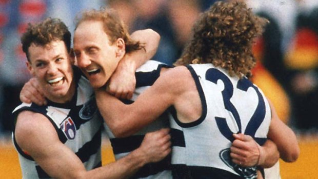 Gary Ablett Snr with Geelong teammates Michael Mansfield and Garry Hocking at the MCG in 1994.  Originally filed: 26-09-1994