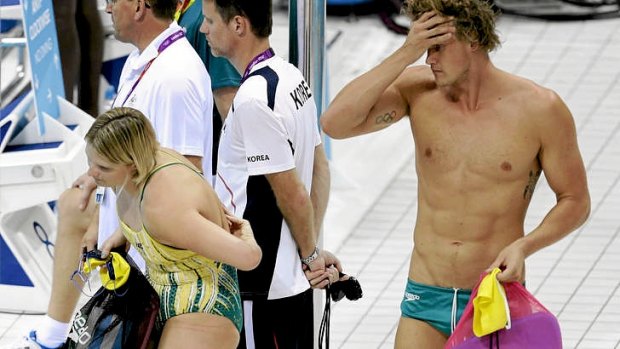 Australian swimmers Leisel Jones (left) and Kenrick Monk on the pooldeck yesterday.