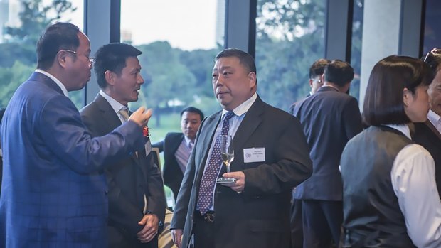 Huang Xiangmo (far left) and NSW MLC Ernest Wong at the 2014 unveiling of an Australian Guangdong Chamber of Commerce plaque at NSW Parliament.