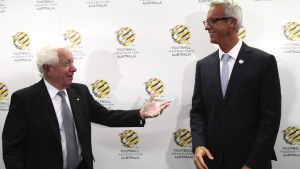 "The giant continues to be not only awake, but on the move. The game's statistics around participation, crowds and television ratings are hugely impressive" ... new FFA CEO David Gallop, right and chairman Frank Lowy.