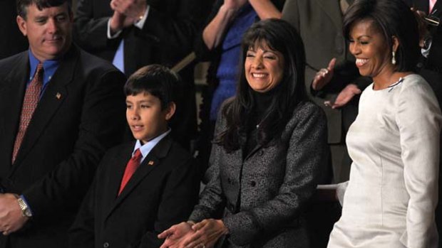 Michelle Obama with John, Dalllas and  Roxanna Green at the State of the Union address.