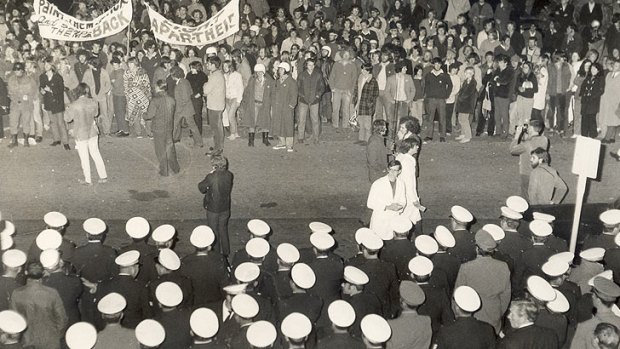 Anti-Springbok protesters face awall of police in Brisbane in 1971.
