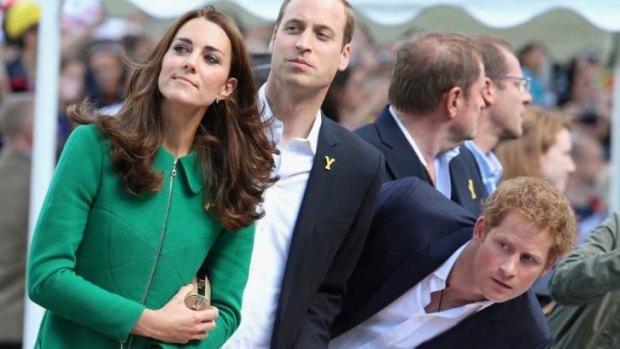 The Duke and Duchess of Cambridge, plus Prince Harry, watch as Cavendish crashes.