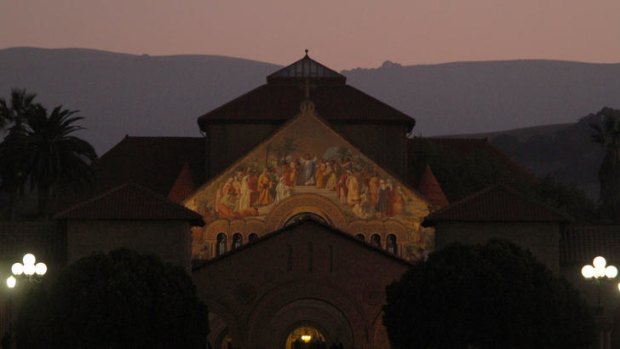 People enter the Memorial Church at Stanford University for the private memorial service of Steve Jobs.