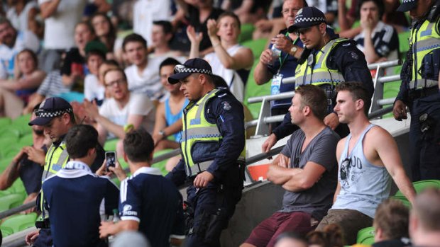 Police patrol the stands during the round 19  match between Melbourne Victory and the Western Sydney Wanderers.