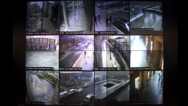 Surveillance tactics ... a video wall shows New York police officers an interactive map of the city.