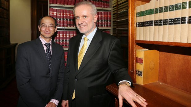 Law Institute president Reynah Tang and Justice Emilios Kyrou.