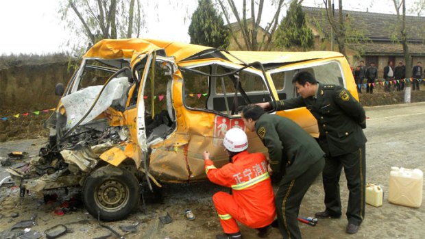 This school bus was packed with 62 children and two teachers when it crashed head-on into a truck, killing 20.