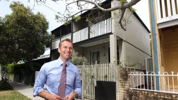 NSW Planning Minister Rob Stokes in front of a Redfern terrace.