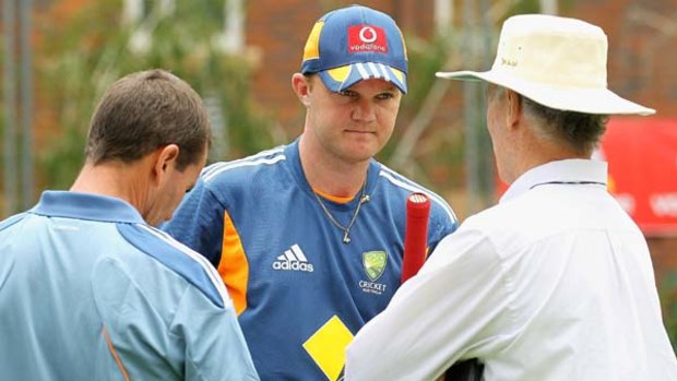 Axed .... Doug Bollinger, centre, speaks with chairman of selectors Andrew Hilditch, left, and selector and national talent manager Greg Chappell