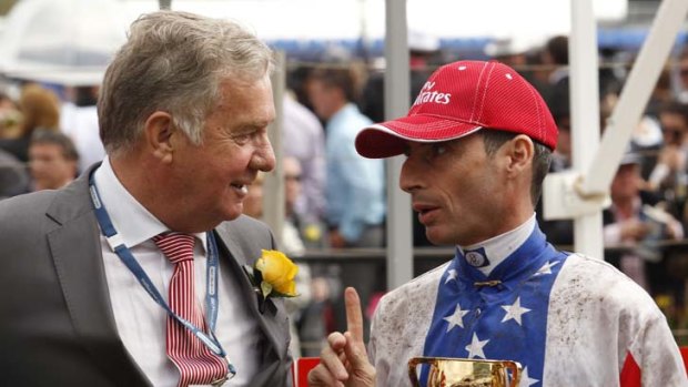Perfect partners &#8230; Gerry Ryan with Americain's jockey Gerald Mosse after last year's Melbourne Cup.