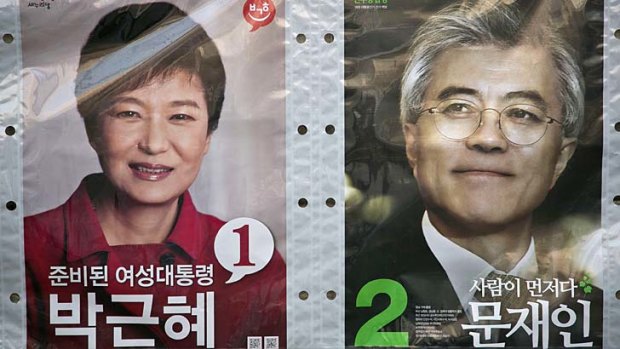 Electioneering: Seoul's spying agency has been accused of helping to influence the recent election between Park Geun-hye (left) and Moon Jae-in.