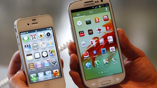 Dominating ... Android devices - such as Samsung's Galaxy S III (right) - are outpacing Apple's iPhone.