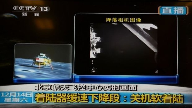 Touchdown: A screen grab from China Central Television's live footage shows China's first lunar rover after it landed on the moon on December 14. 