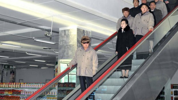 Family ties: Kim Jong-il in 2010. Immediately behind are his sister Kim Kyong-hui and son Kim Jong-un.