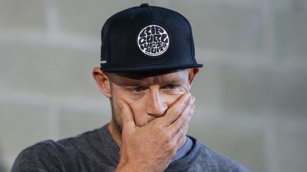 Reflection: an emotional Mick Fanning speaks to media after returning to Australia.