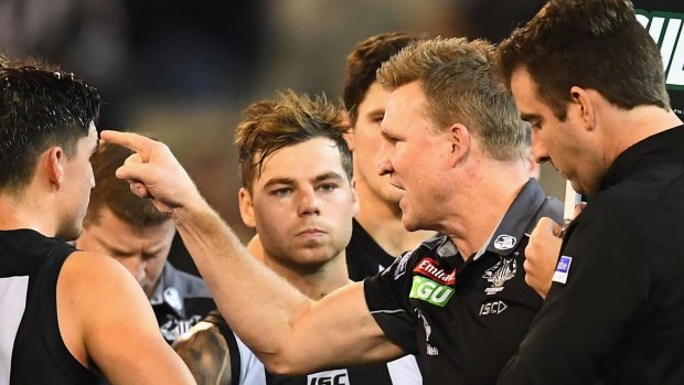Laying down the law: Nathan Buckley was irate at quarter-time.