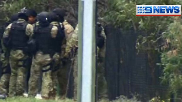 Specialist police have arrived in Banyo, in Brisbane's north, where a siege is underway.