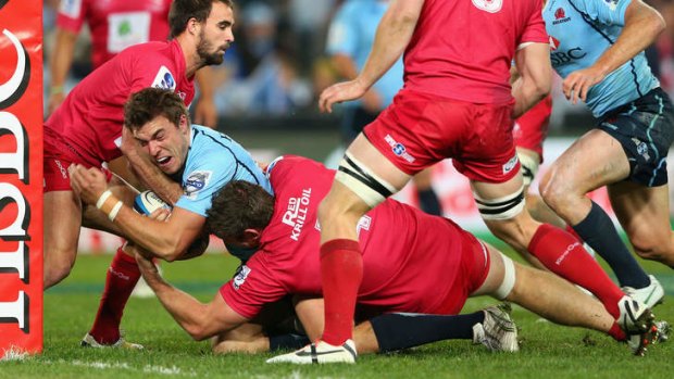 Try time: Cam Crawford of scores a try for the Waratahs.