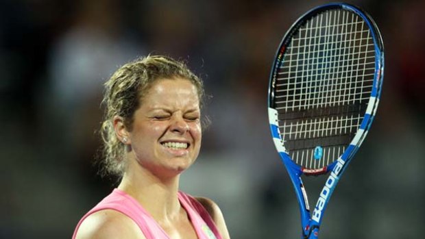 Kim Clijsters reacts after a point against Victoria Azarenka during the 2011 Medibank International this week.