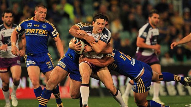Billy Slater runs into the Eels' defence.
