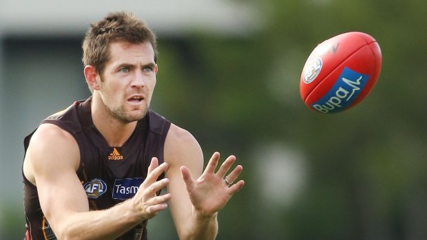 Hawthorn's Luke Hodge, coming back from a three-match suspension, marks the ball during training at Waverley Park.