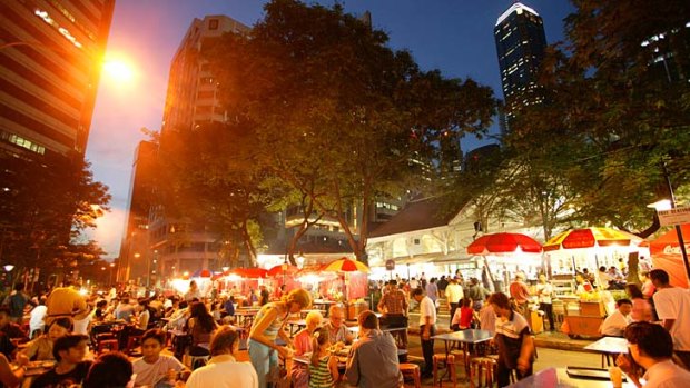 Streets ahead ... outdoor dinning at the Lau Pa Sat market.