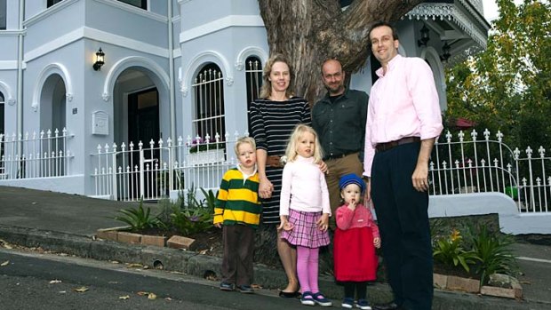Thorough inspection: Host Adam Ford with the Dolton family in Paddington.