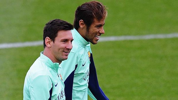 Neymar, right, pictured with superstar Lionel Messi.
