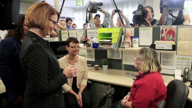 Julia Gillard chats with Cath Potterduring a visit to Ability Option in Seven Hills, part of a tour of local services in the Western Suburbs of Sydney.