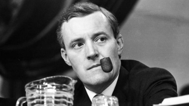 Stalwart leftist: Tony Benn puffs on his pipe at a Labour conference in Scarborough, England, in 1967.