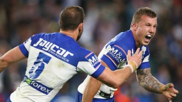 That's settled it: Trent Hodkinson celebrates kicking the winning field goal for the Bulldogs against the Sea Eagles.